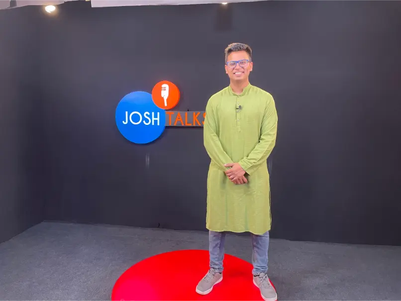 Shrey on stage at Josh Talks